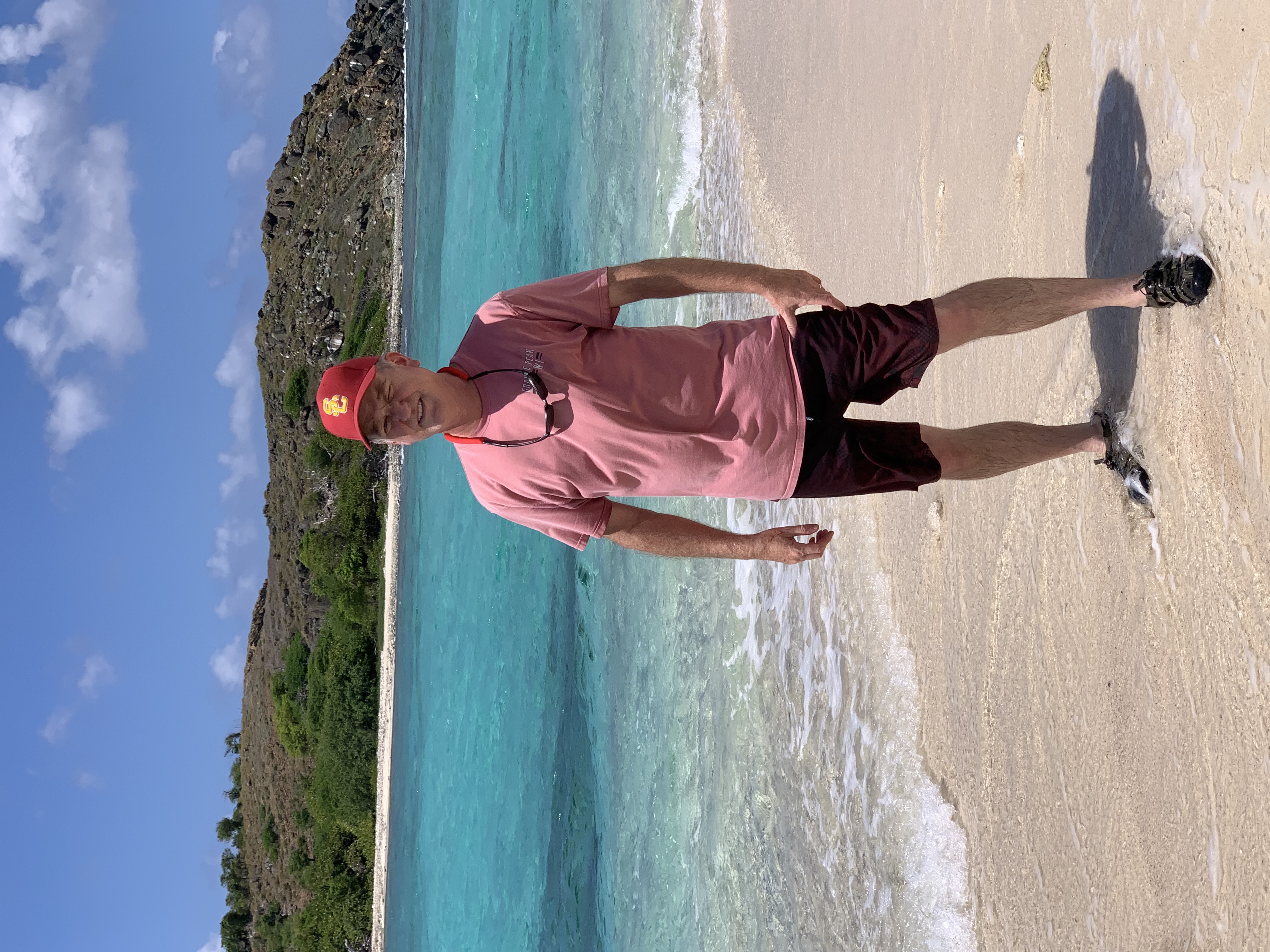 Captain Tim McNamara on a beach in the BVIs
