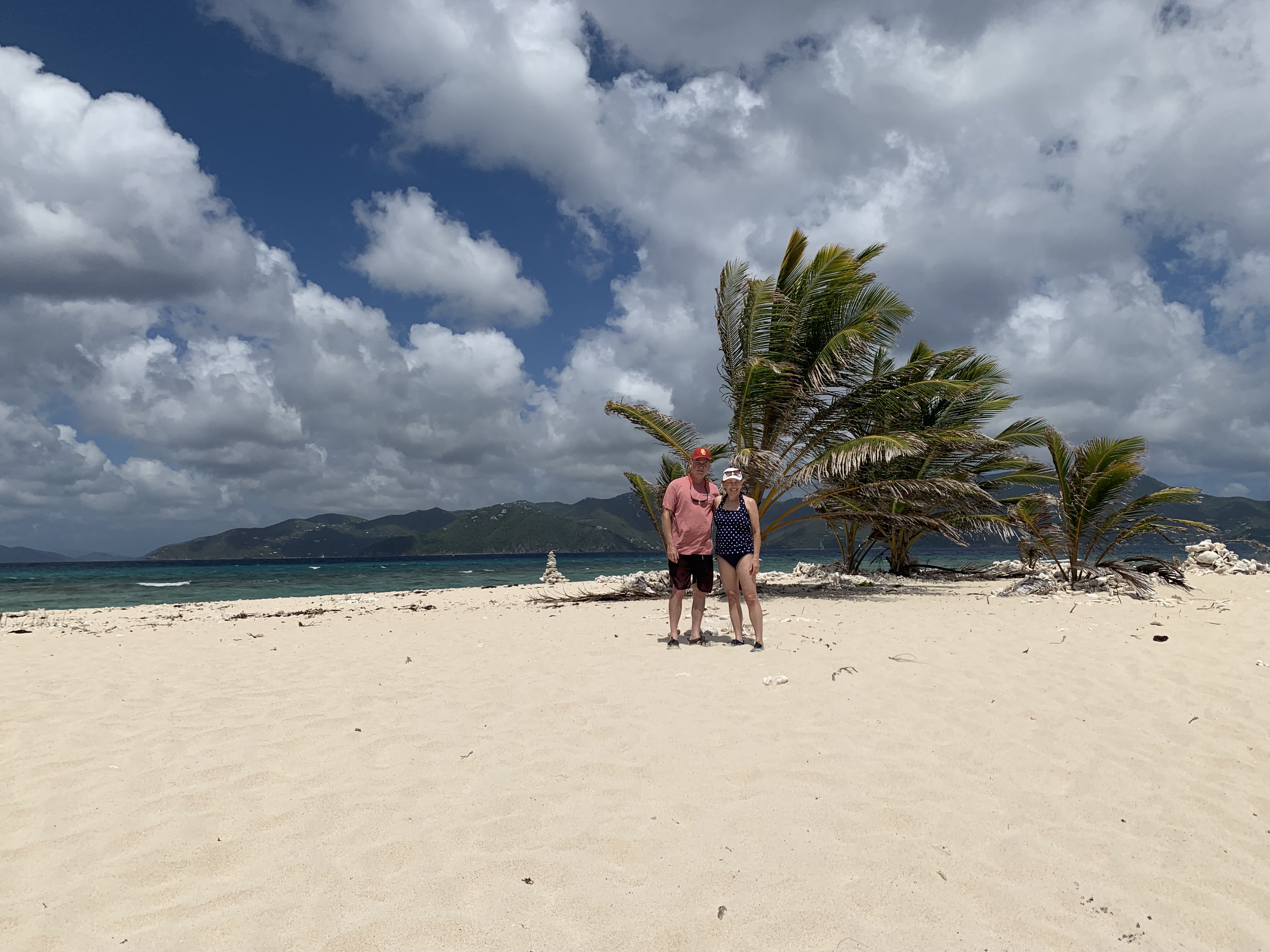 Tim and Donna together on a white sand beach in the BVIs