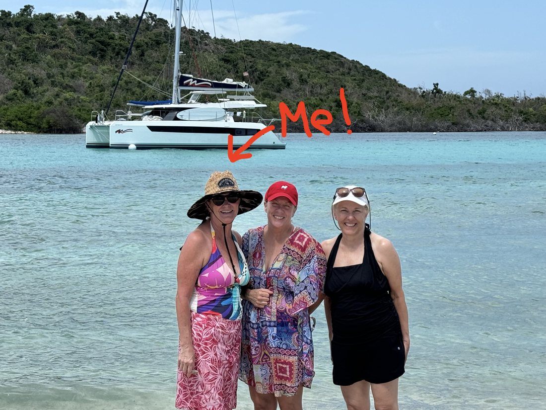 Melissa (see the arrow!) with the crew on a Caribbean sandbar